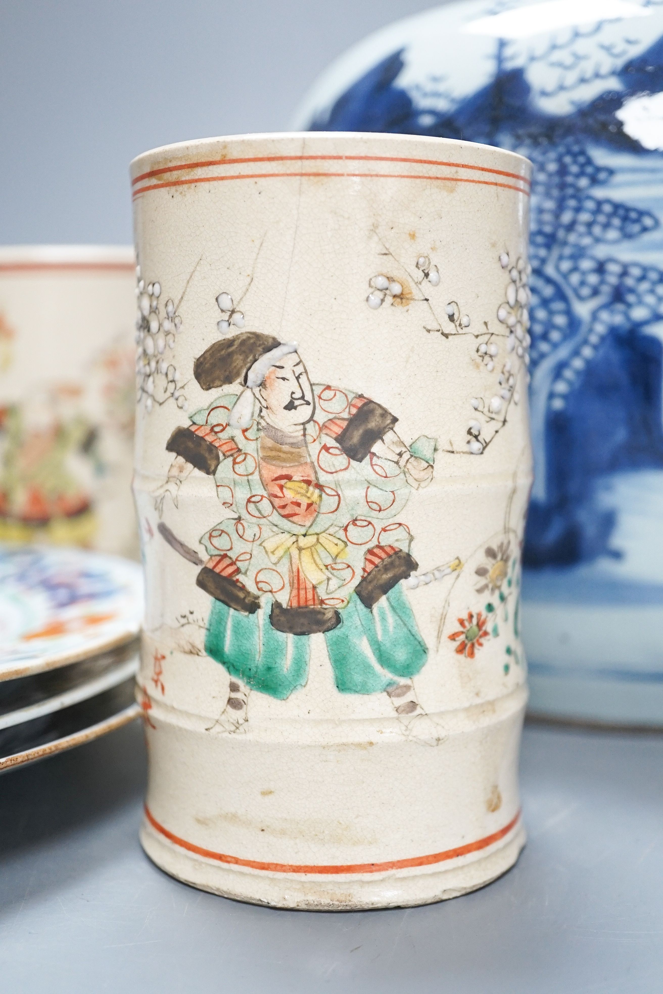 An 18th century Chinese blue and white jar, three 18th century clobbered Chinese plates and a pair of Satsuma vases